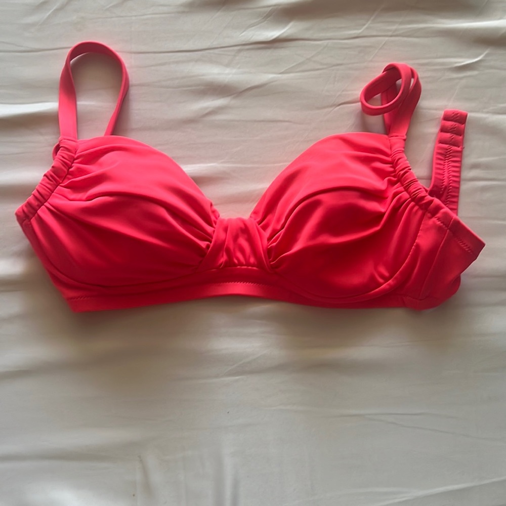 J crew, hot pink bra top it says size extra small, but it’s a B/C cup.
